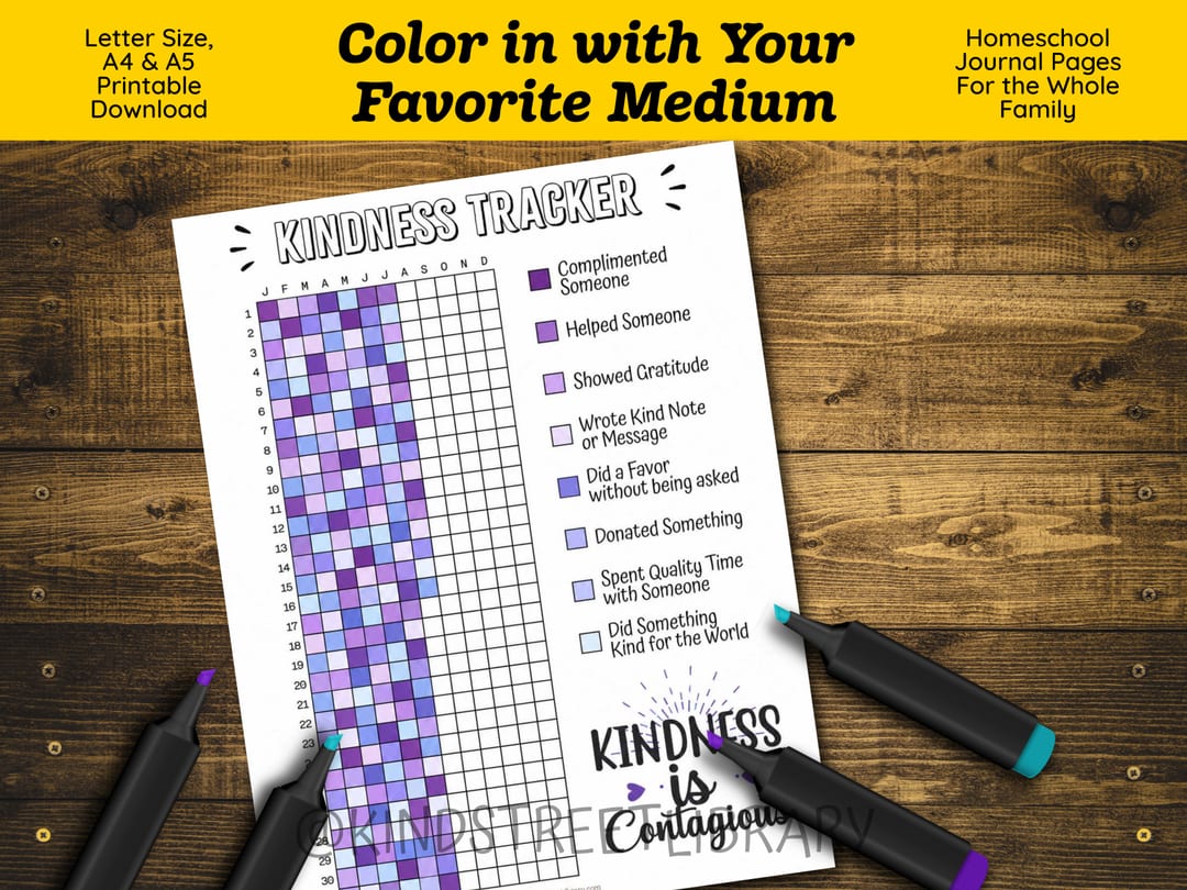 'Color in with Your Favorite Medium' graphic showing the partly colored Kindness Tracker page on a wooden desk with markers in purple and teal resting around it